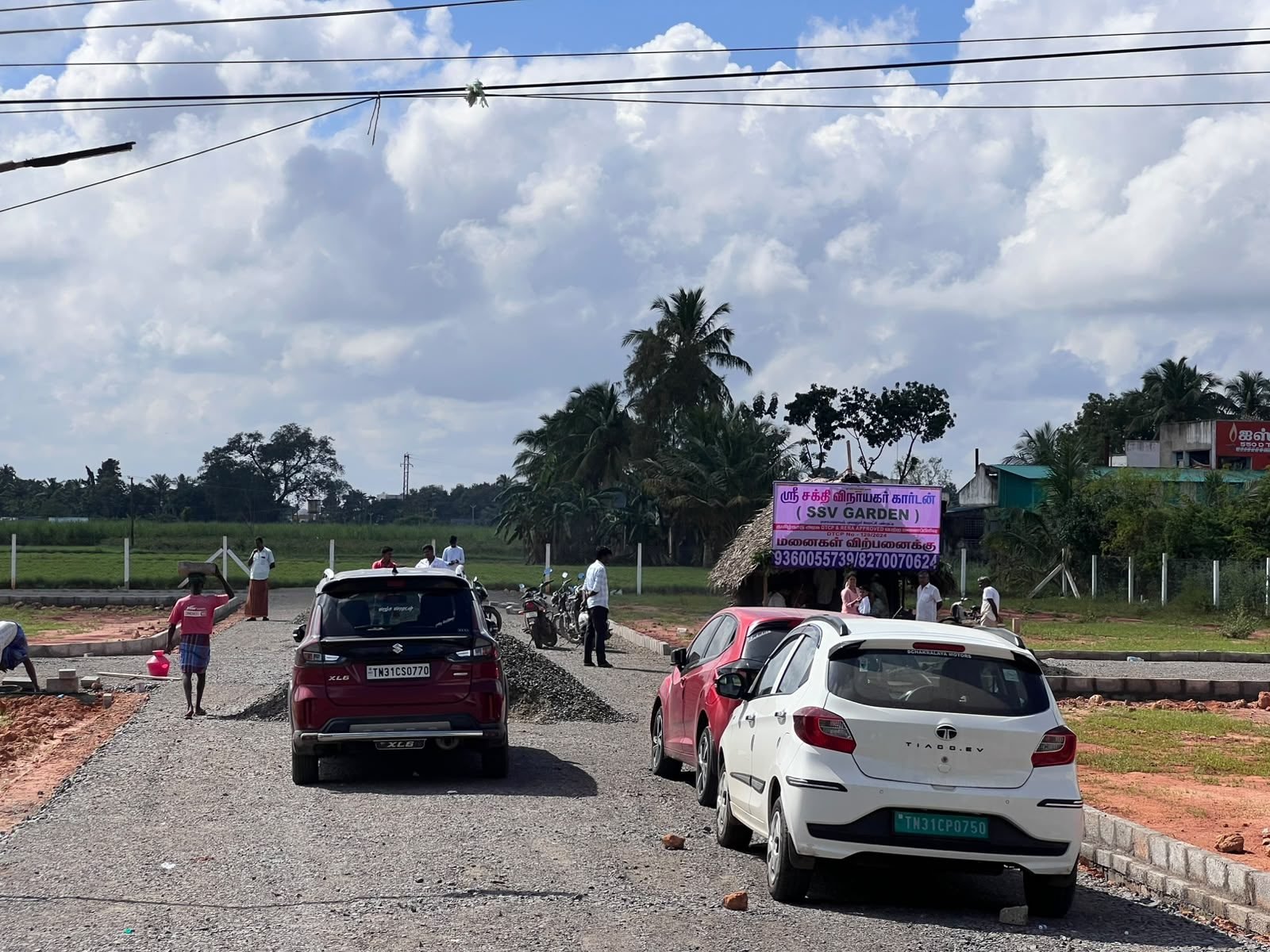 Vehicles at the SSV Garden site entrance during a customer visit