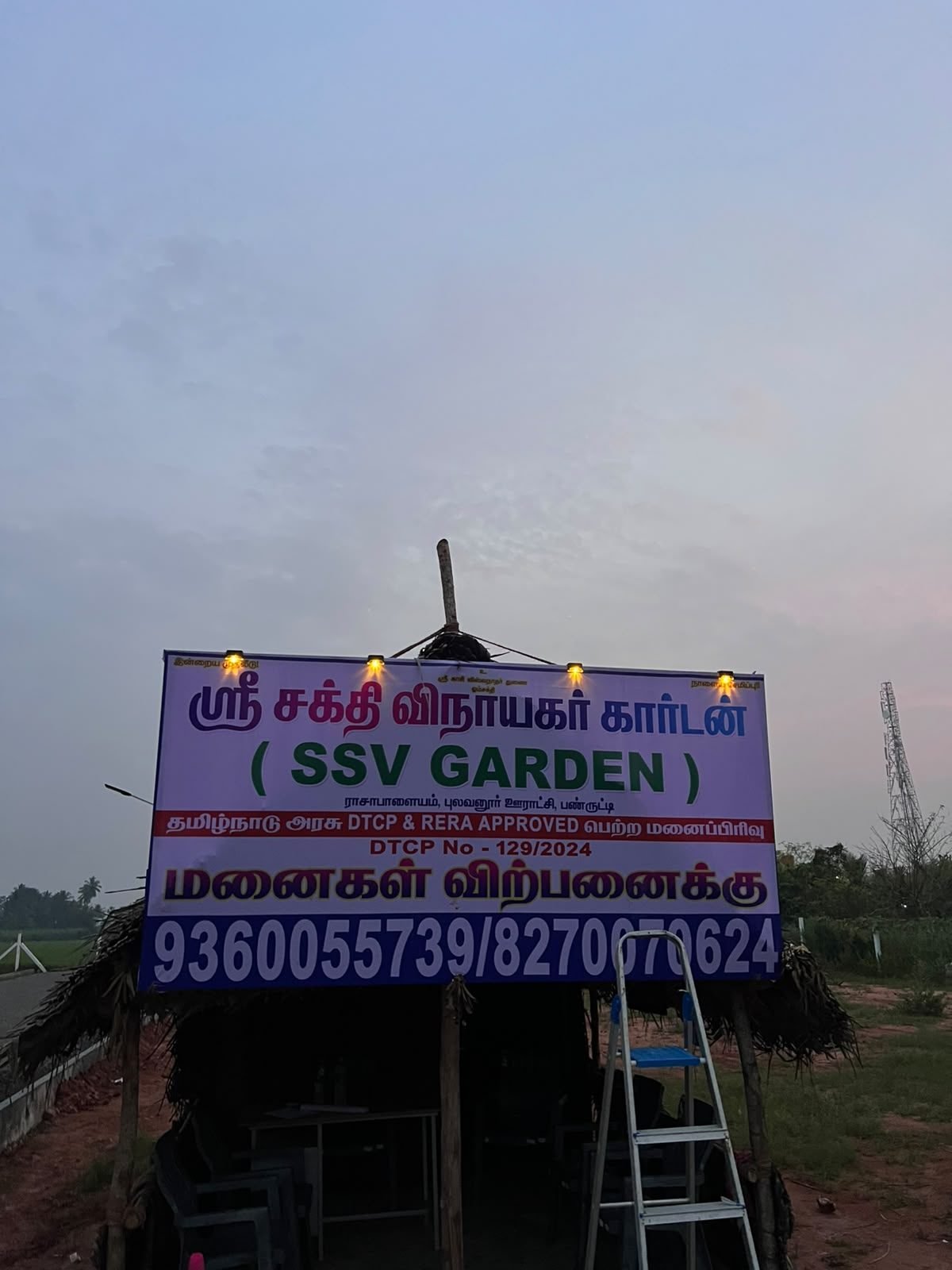 SSV Garden site office signboard with DTCP and RERA approval details